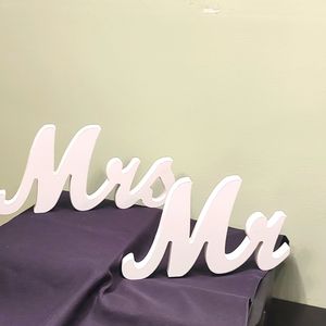 Mr and Mrs wood with white paint